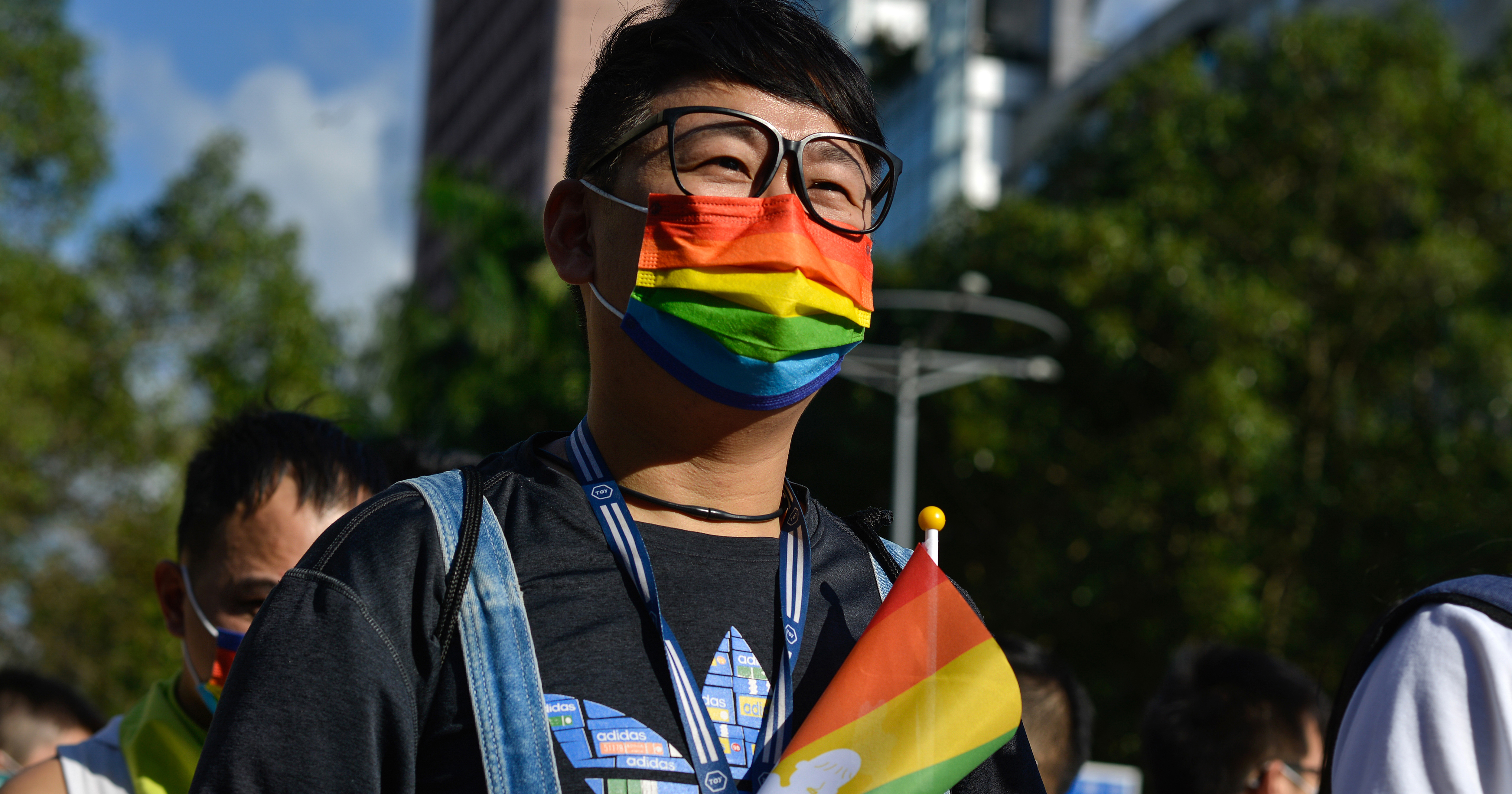 Man dressed in rainbow colors