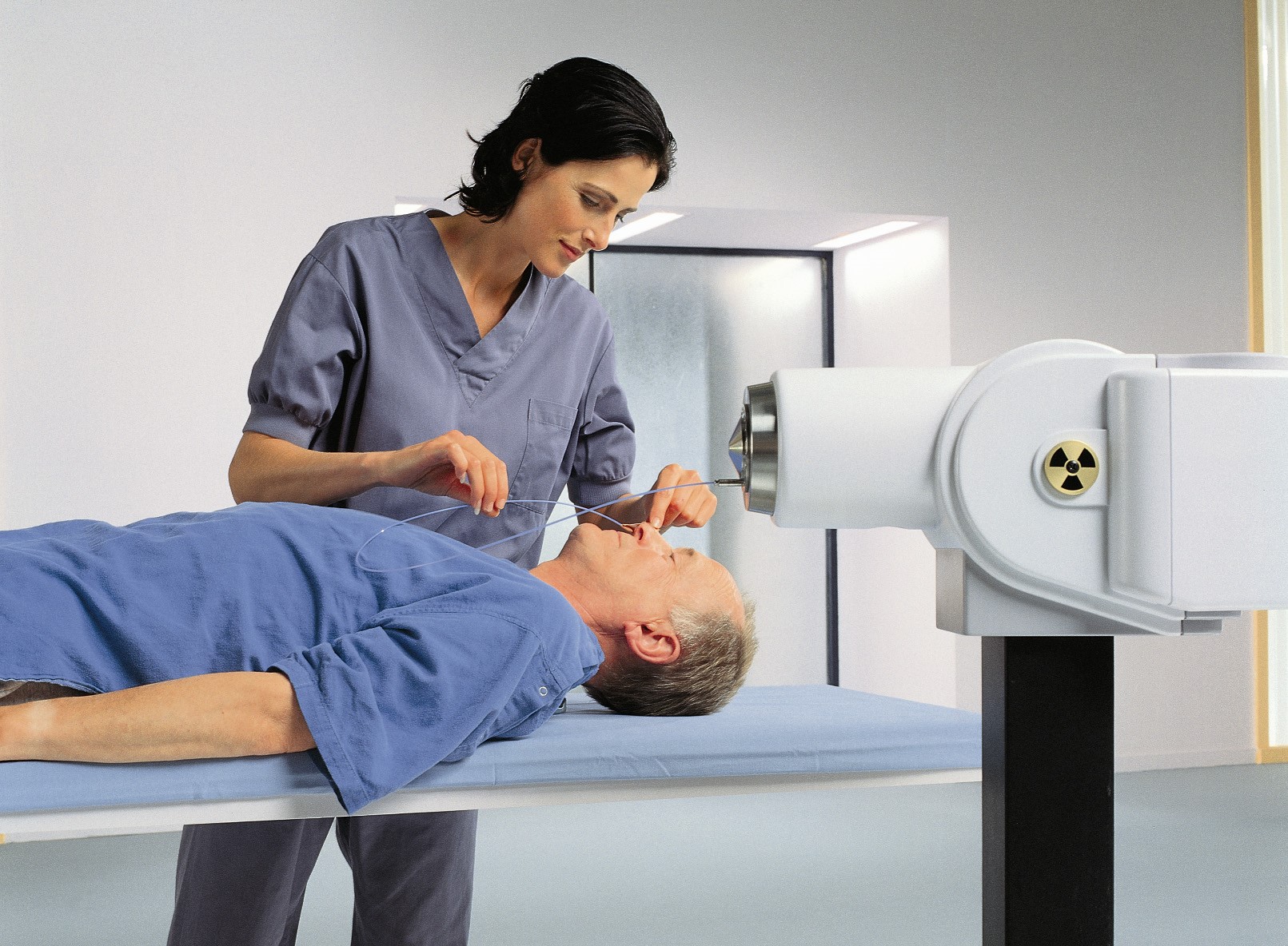 Innovative Cancer Treatment: Medical professional treating a patient with the Nucletron Brachytherapy Solutions