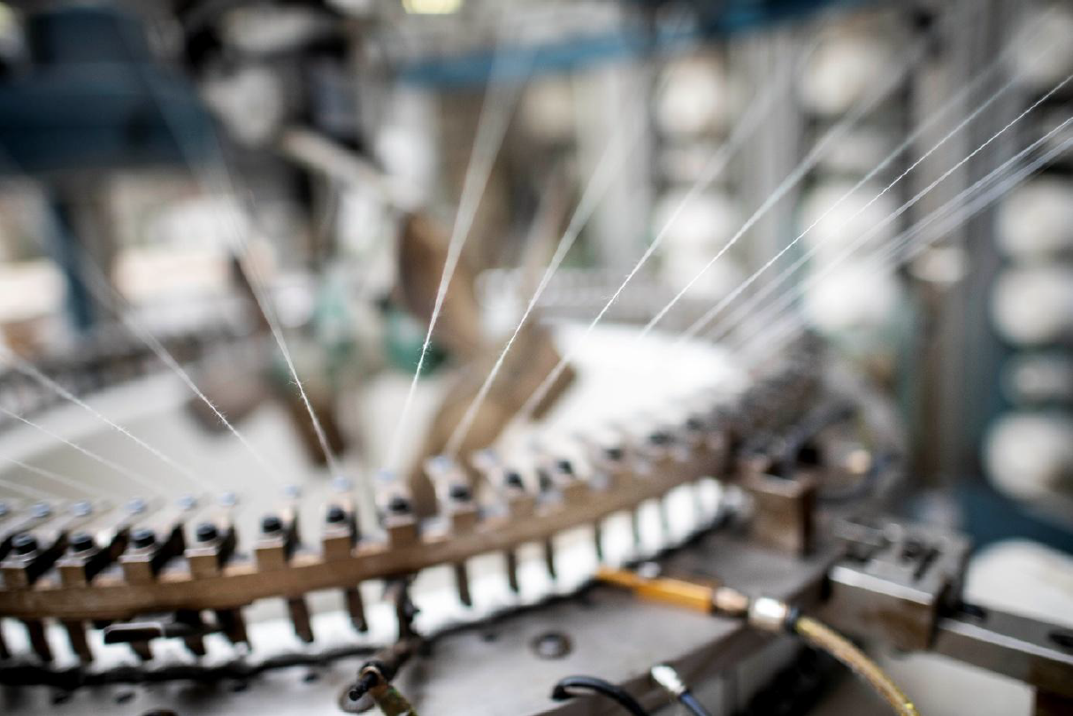 Photo of part of a machine with threads
