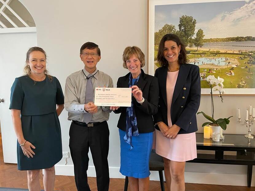 Ambassador Margriet Vonno, ADB-DutchCham President Marjolein Oyen and NCA President Barbara Voskamp handing over the cheque to founder & CEO of Waterways Watch Society, Mr. Eugene Heng.