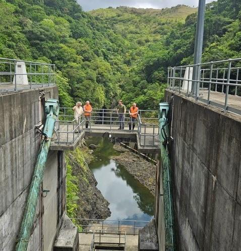 Dutch and Fijian water experts inspecting flood control infrastructure along the Ba River