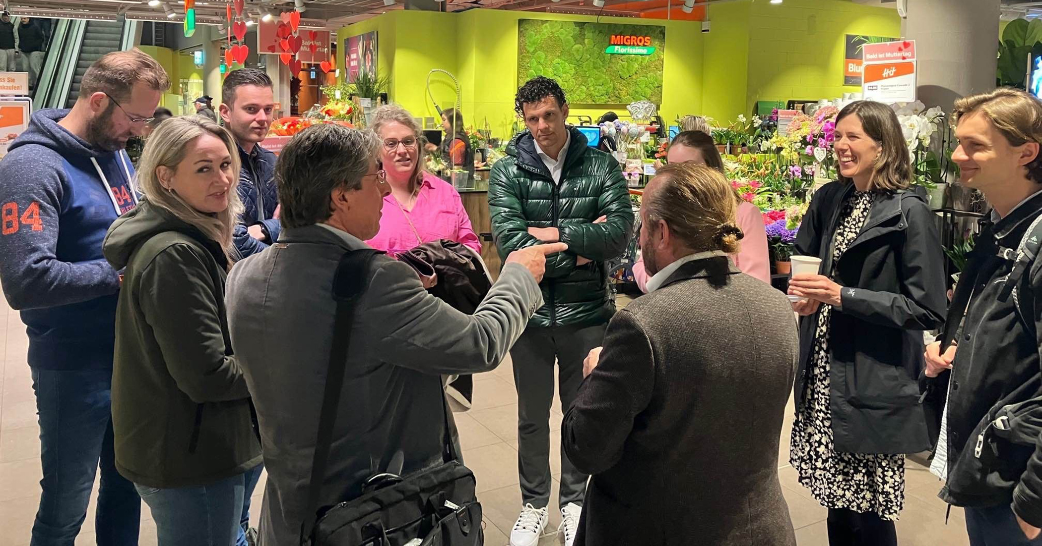 Visit of Dutch gardeners or flower growers to a Migros supermarket - one of the biggest retailers in Switzerland