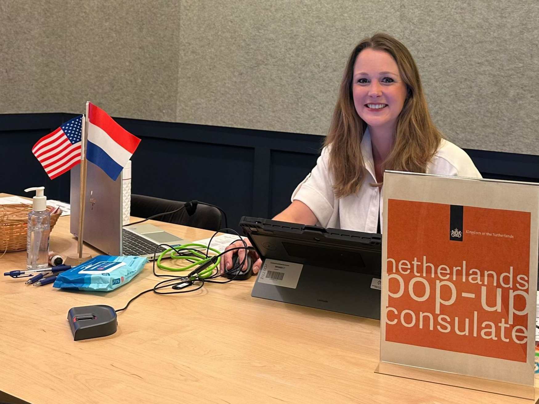 A consular officer at her desk